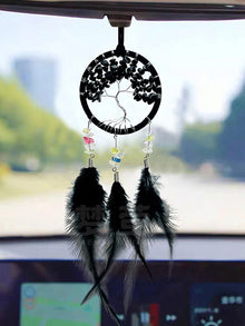 Window hanging crystal dreamcatcher with feathers decorative chime for light-catching display, relaxing ambiance, and bohemian room decor.