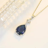 Women’s 925 silver teardrop sapphire necklace for anniversary gifts, formal outfits, and everyday elegance.