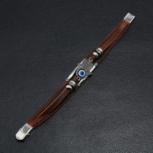 Women’s Evil Eye Fatima Hand leather bracelet with charm detail for daily wear, protective symbolism, and layered fashion looks.