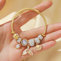 Women’s gold mermaid beaded cuff bracelet for beach-inspired fashion, party styling, and everyday accessory wear.