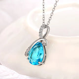 Huitan blue zirconia pendant necklace for women with a delicate chain for dressy outfits, gifting, and daily accessorizing.