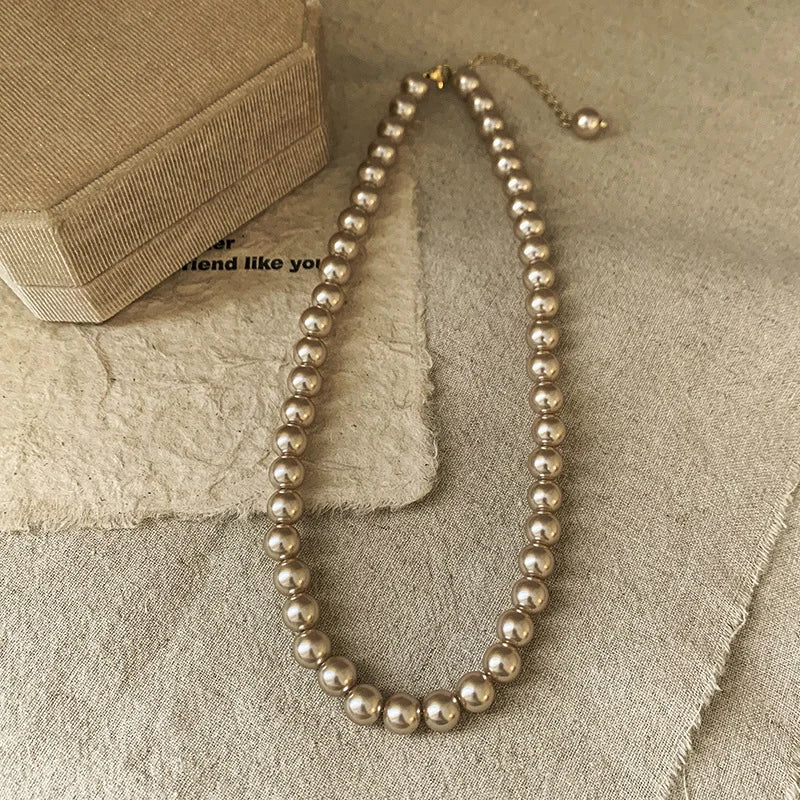 Pearl & Zircon teardrop pendant for women’s occasion wear, dinner outfits, and elegant jewelry styling.