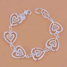 Women’s Sterling Silver Heart Chain Bracelet jewelry bracelet for casual outfits, layering with necklaces, and gift occasions.