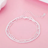 Women’s sterling silver square chain bracelet for casual accessorizing, dressy looks, and stackable jewelry wear.