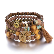 Wooden bead bracelet stack in boho style with tassel for daily accessorizing, outfit layering, and relaxed fashion looks.