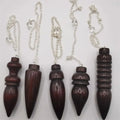 Wooden Karnak Pendulum for dowsing, divination, and energy work.