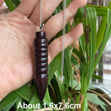 Wooden Karnak Pendulum for dowsing, divination, and energy work.