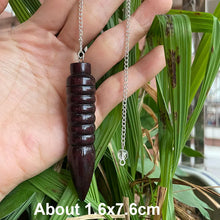 Wooden Karnak Pendulum for dowsing, divination, and energy work.