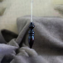 Wooden Karnak Pendulum for dowsing, divination, and energy work.