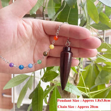 Wooden Karnak Pendulum for dowsing, divination, and energy work.