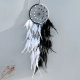 Woven handmade Dream Catcher decor with two-color feathers for wall hanging, boho interior styling, and peaceful room decoration.