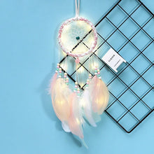 Woven net LED dream catcher with feathers for home decor, relaxing room lighting, and bohemian wall styling.