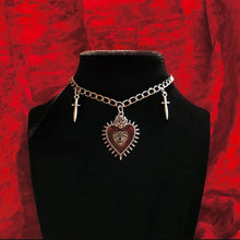 Y2K gothic peach heart sword choker necklace for retro trend styling, party outfits, and bold everyday accessorizing.