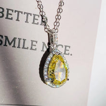 Yellow stone pear pendant necklace for accessorizing dresses, celebrations, and daily fashion use.