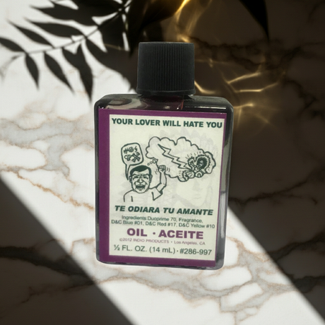 Your Lover Will Hate You Wish Oil dressing oil bottle for candle anointing, breakup intentions, and ritual work.