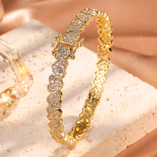 ZAKOL heart charm link bracelet for dressing up casual looks, layering with jewelry, and gift giving.