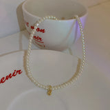 Pearl & Zircon teardrop pendant necklace for formal events, romantic outfits, and stylish everyday accessorizing.