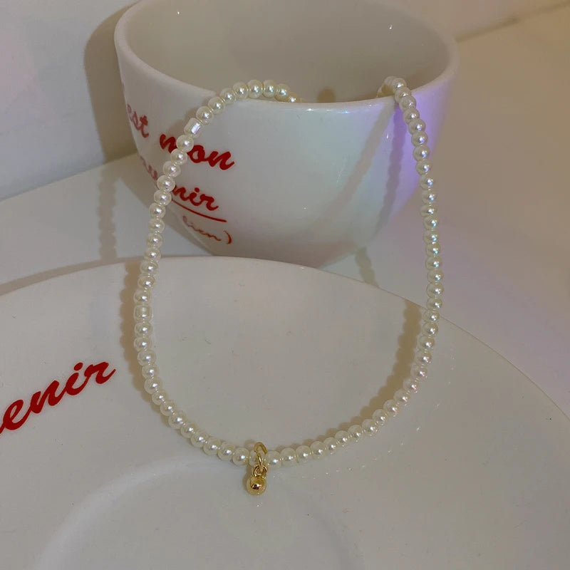 Pearl & Zircon teardrop pendant necklace for formal events, romantic outfits, and stylish everyday accessorizing.
