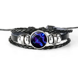 Zodiac Leather Charm Bracelet with luminous design and leather strap for statement accessorizing and zodiac gift giving.