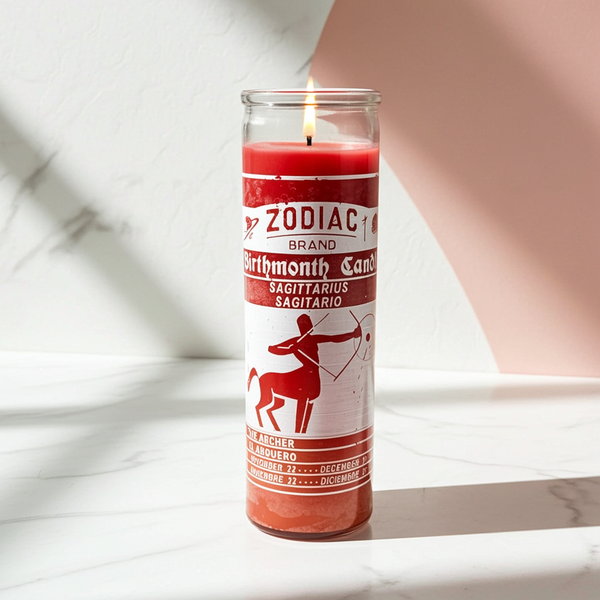 Zodiac Sagittarius 7 day candle in glass jar for astrology rituals, intention setting, and spiritual altar use.