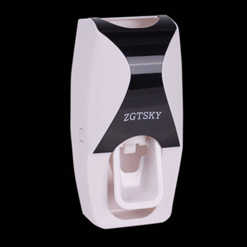 Automatic Toothpaste Dispenser Set components — dispenser and toothbrush holder on white background.