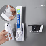 Automatic Toothpaste Dispenser Set with toothbrush holder for organized bathroom storage.