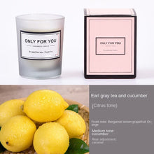 Essential oil candle in glass jar for aromatherapy, stress relief, and soothing room ambiance.