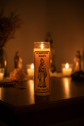 La Santisima Muerte gold 7 day candle for prayer, altar devotion, and spiritual ritual use.