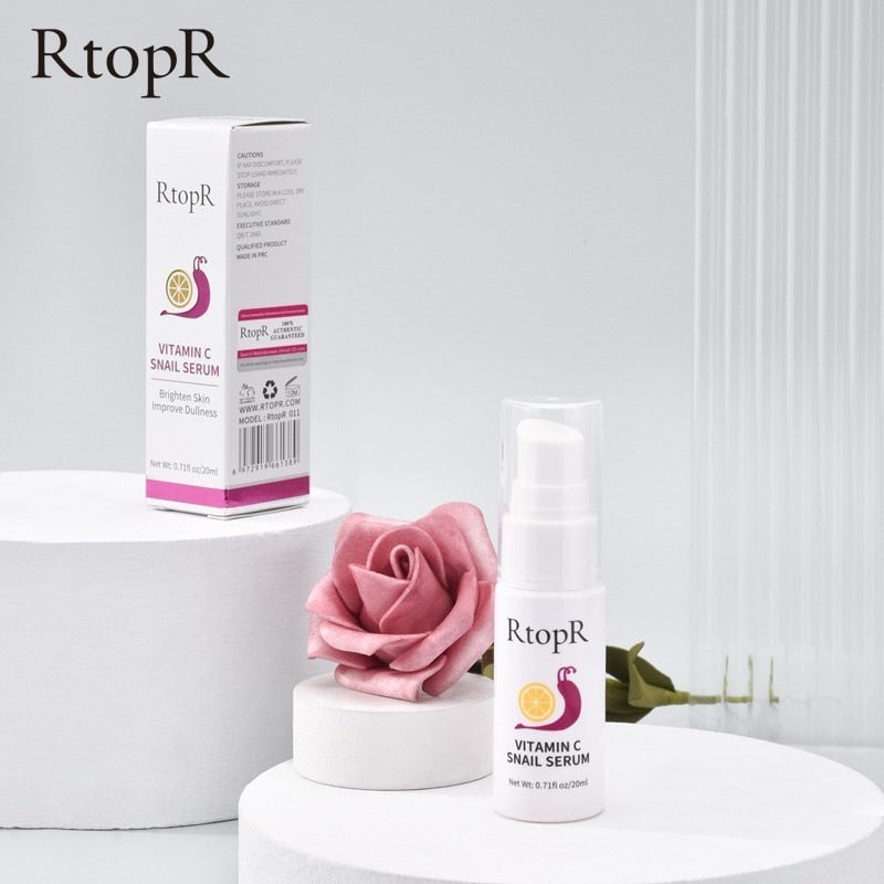RtopR Anti-Aging Shrink Pore Whitening Face Serum applied to face for anti-aging pore treatment.