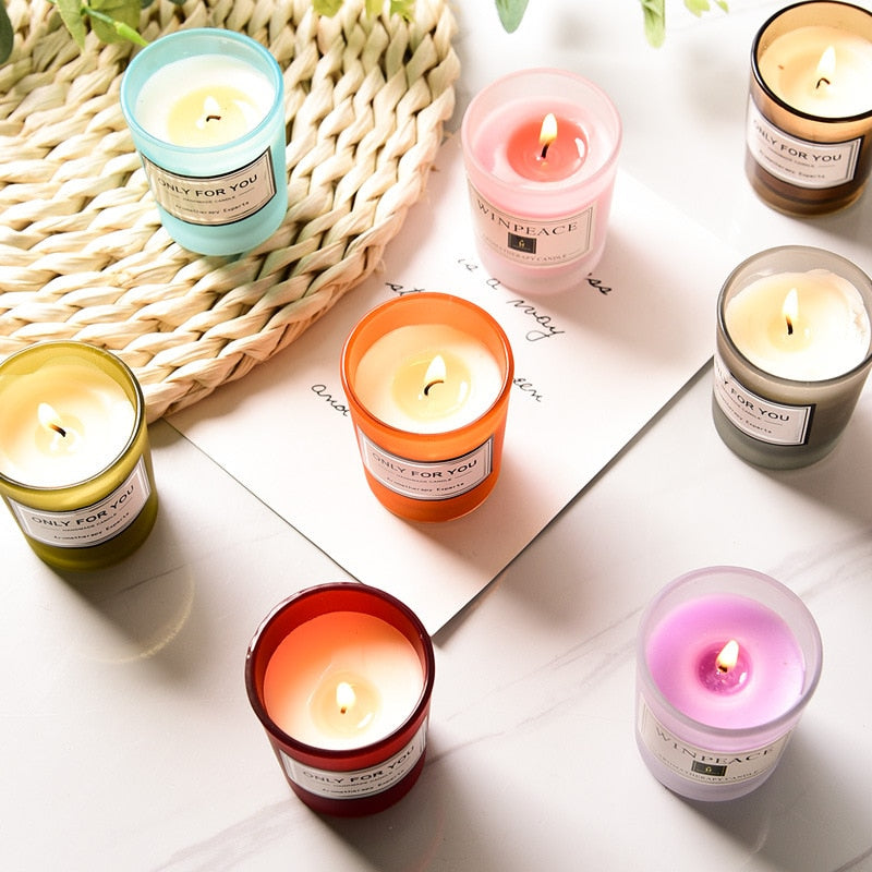 Scented aromatherapy candle in glass container for meditation, relaxation, and room freshening.