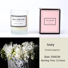 Scented glass candle for relaxation, stress relief, and cozy indoor ambiance.