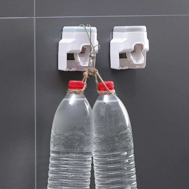 Wall Mount Automatic Toothpaste Dispenser tool-free adhesive strip installation on smooth bathroom surface.