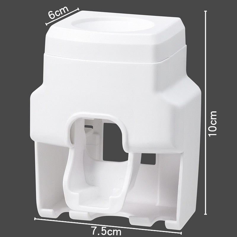 Wall Mount Automatic Toothpaste Dispenser mounted in bathroom for tidy toothbrush and paste storage.