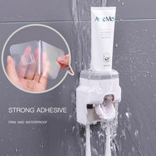 Wall Mount Automatic Toothpaste Dispenser dimensions 7.5 x 10 x 6 cm on white background.