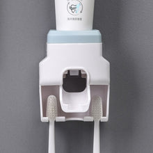 Wall Mount Automatic Toothpaste Dispenser product packaging showing features and installation guide.