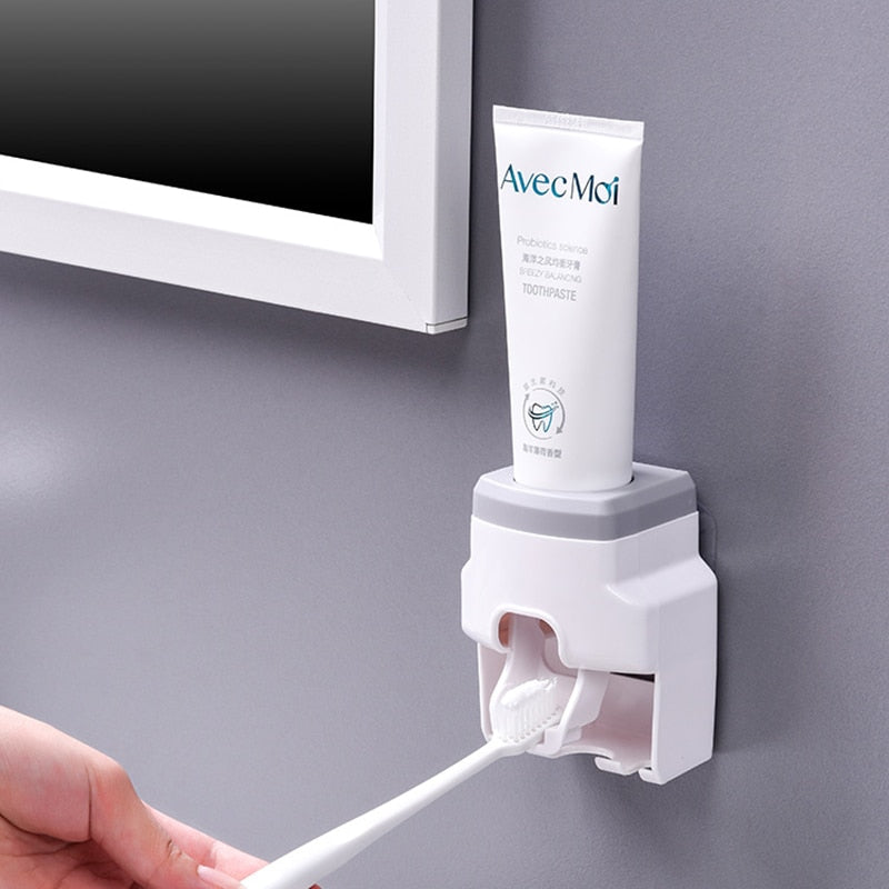 Wall Mount Automatic Toothpaste Dispenser with toothbrush storage for neat bathroom organization.